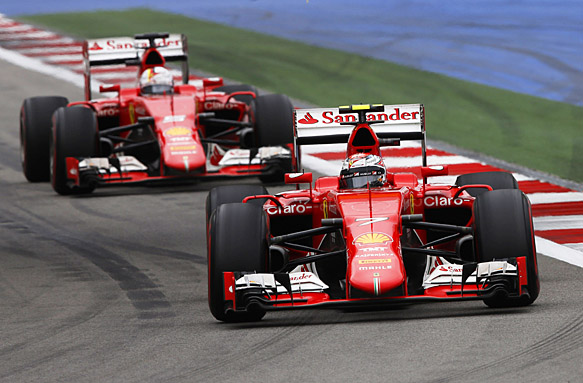 Sochi Autodrom, Sochi, Russia. Sunday 11 October 2015. Kimi Raikkonen, Ferrari SF-15T, leads Sebastian Vettel, Ferrari SF-15T. World Copyright: Charles Coates/LAT Photographic ref: Digital Image _J5R4854